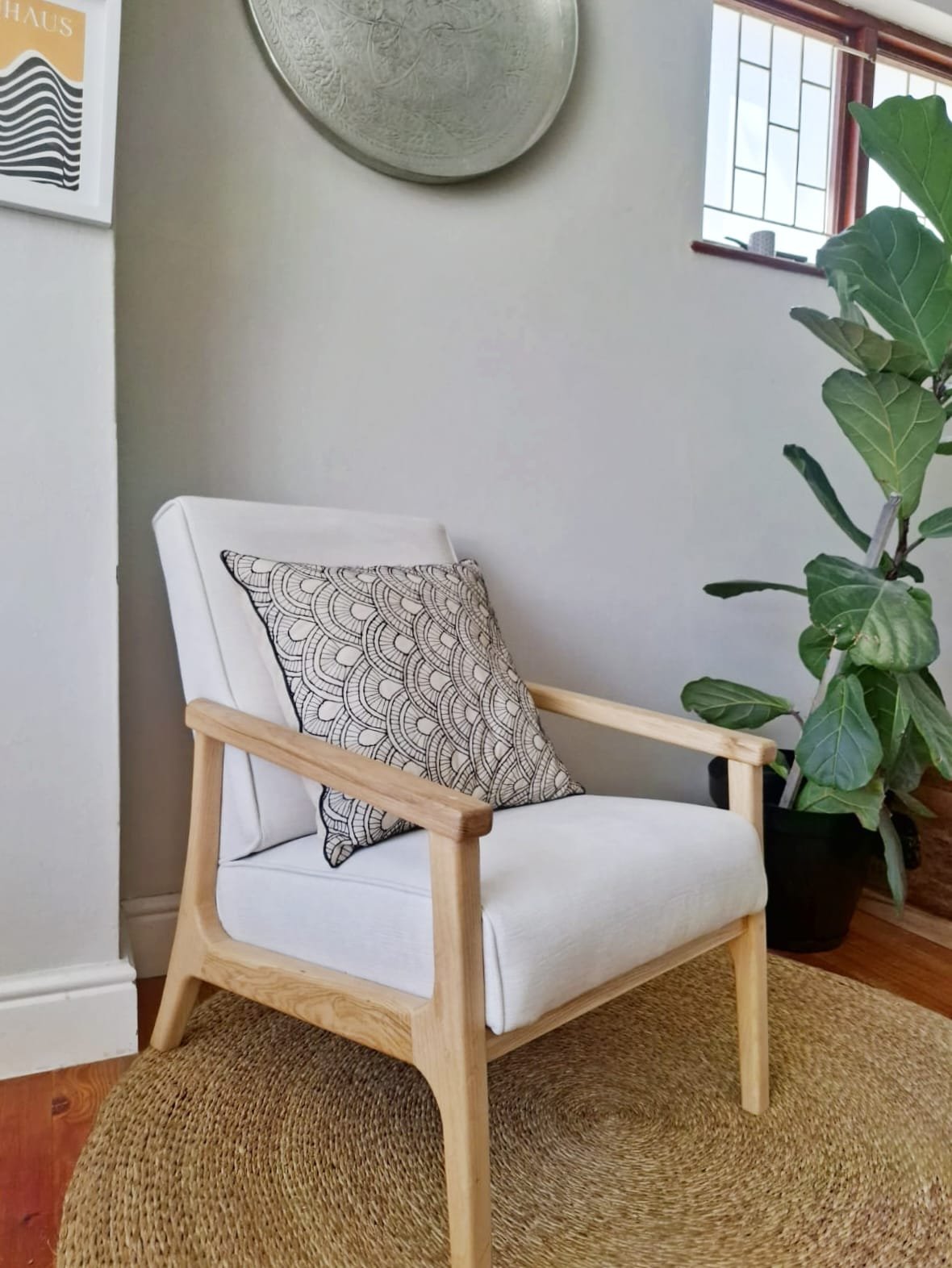 The Aska Lounger — ash-framed upholstered lounge chair
