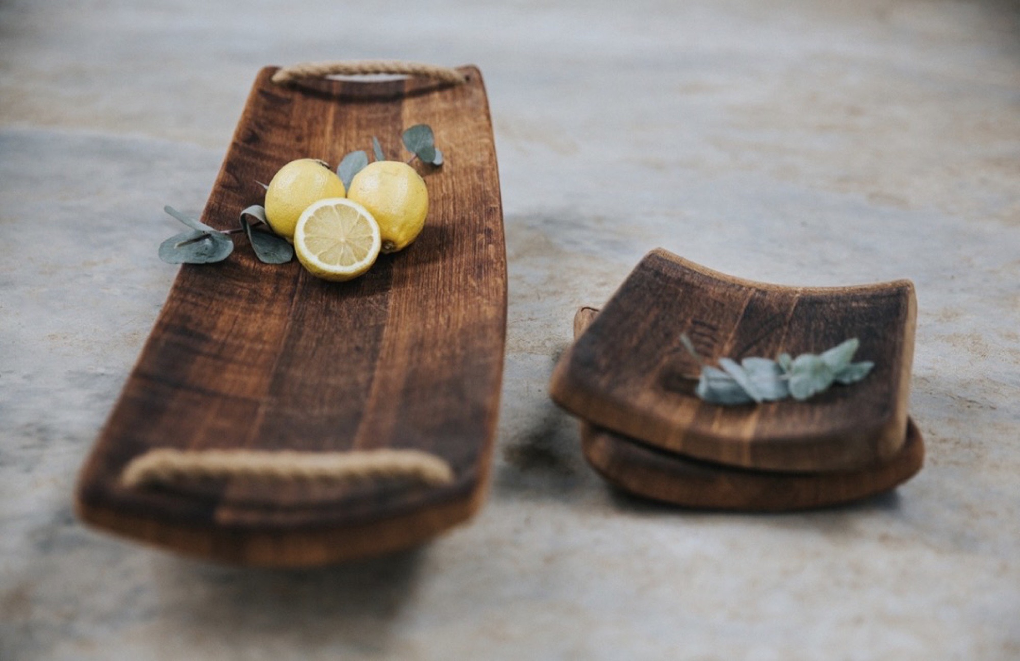 Styled oak charcuterie boards with lemons and eucalyptus