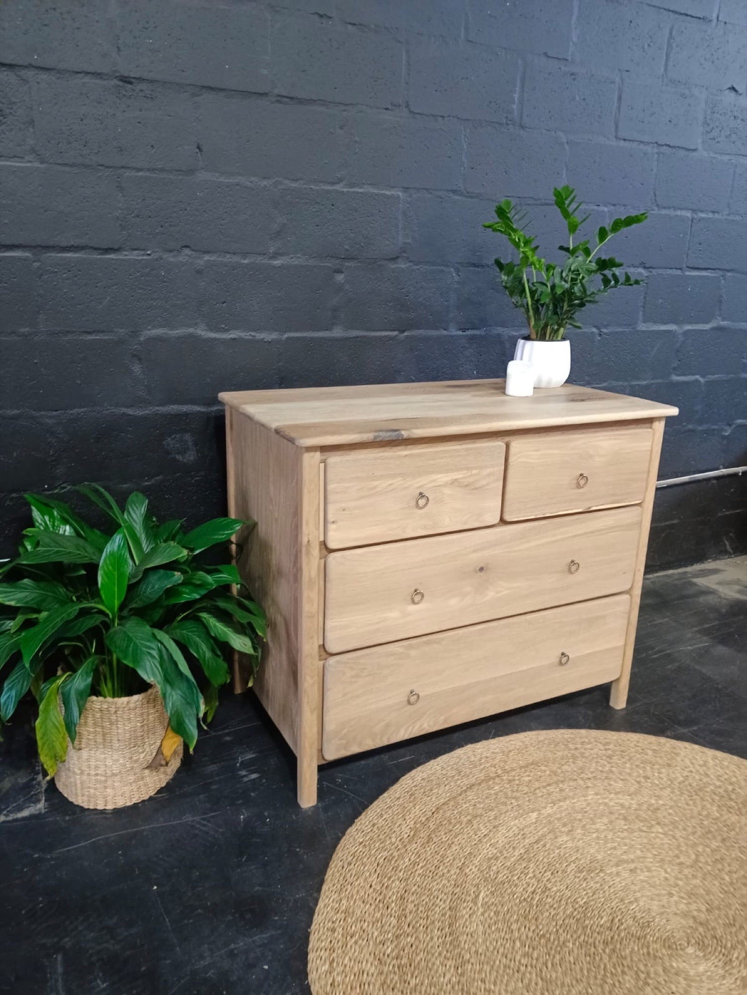 Light oak chest of drawers — three-quarter detail