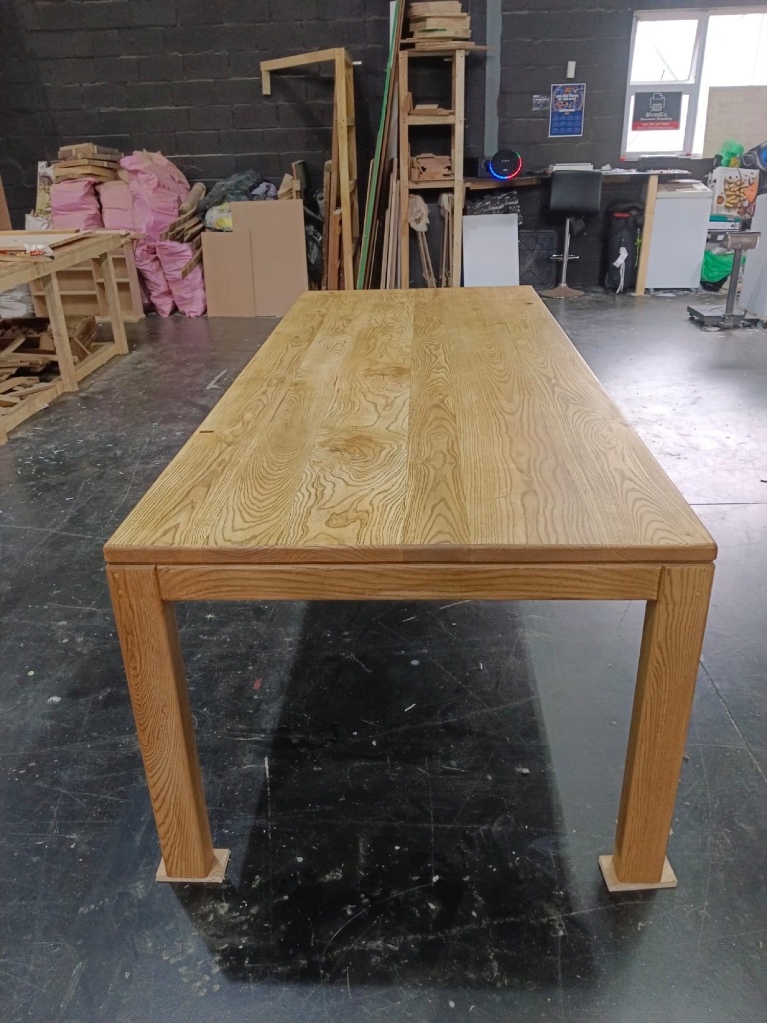 Clean-lined stained ash dining table